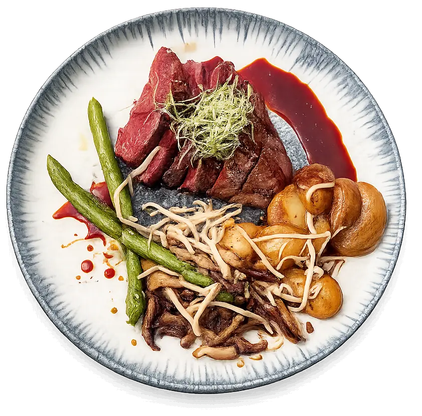 Magret de canard tranché champignons et légumes de saison, plat signature du restaurant L'Hémicycle Toulouse